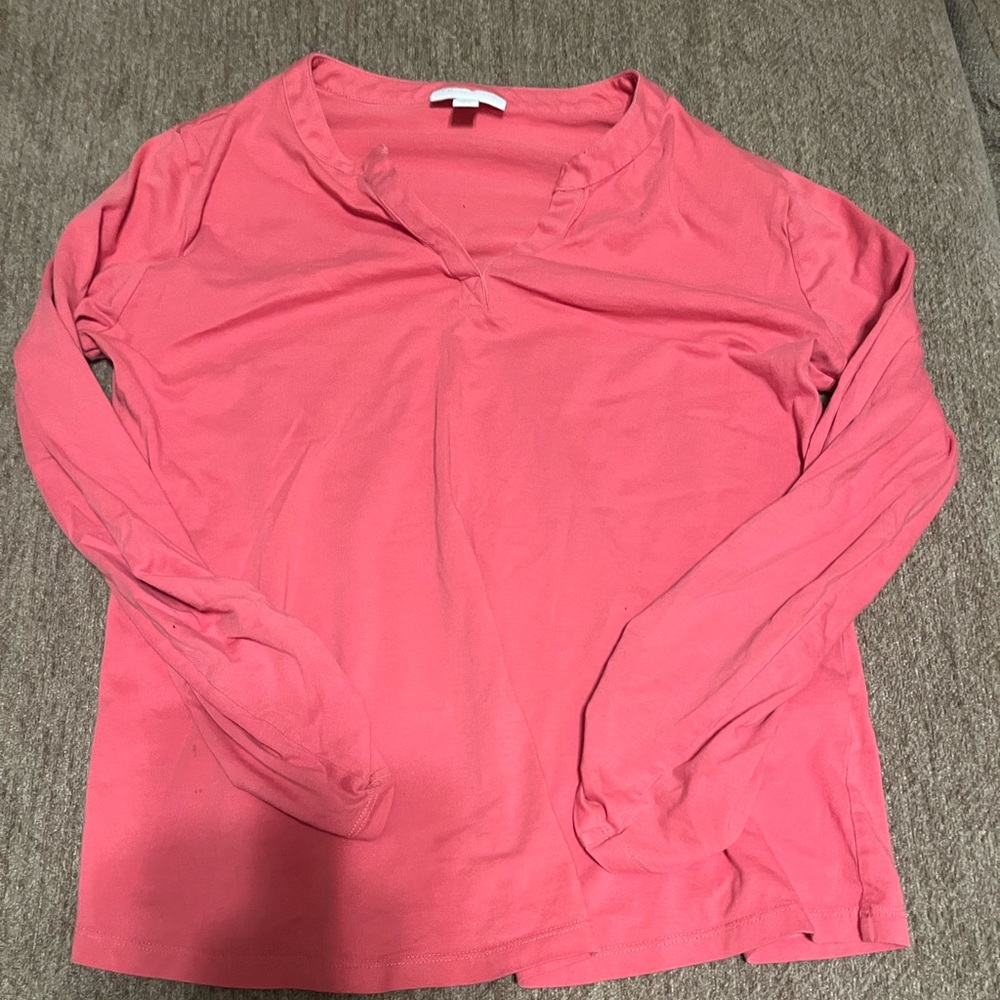 This is a long sleeve shirt that has not been worn